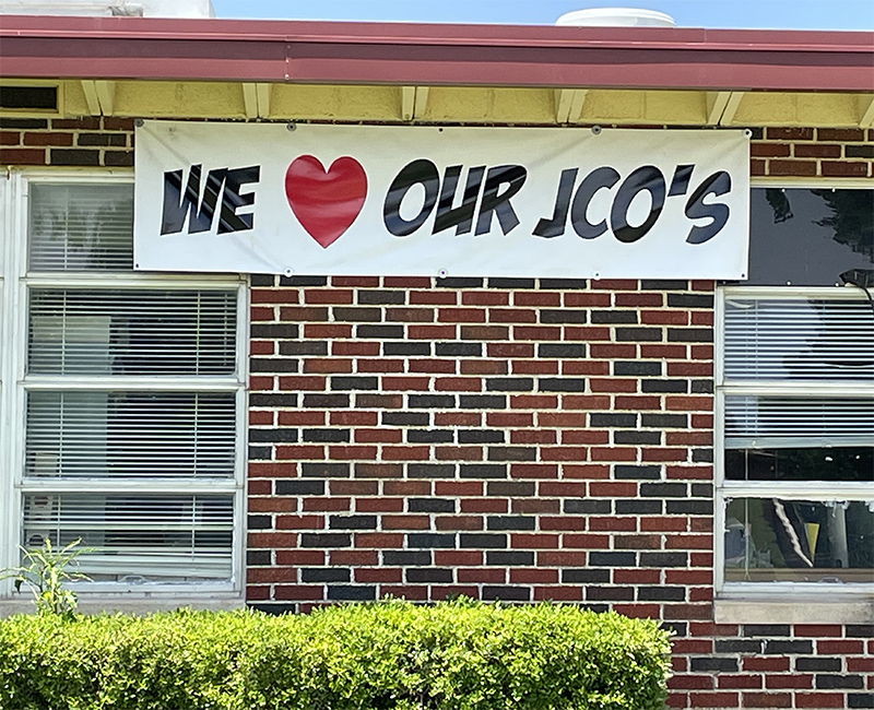 A banner hanging outside the building to celebrate National Correctional Officers Week.