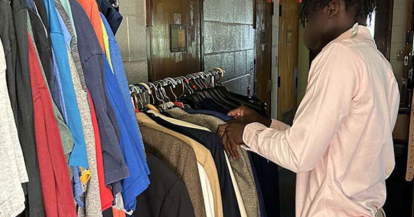 Featured image of youth picking out a sport coat.