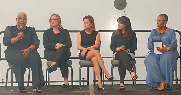 Featured image of Liz Boston speaking at the AWEC conference.