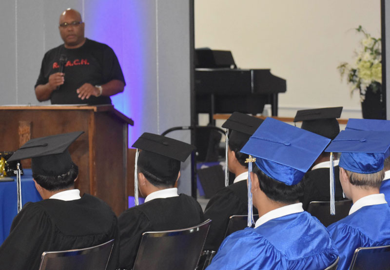 Albert Yancey III, founder of Faith Beyond Incarceration, giving the keynote presentation to graduates at Giddings.