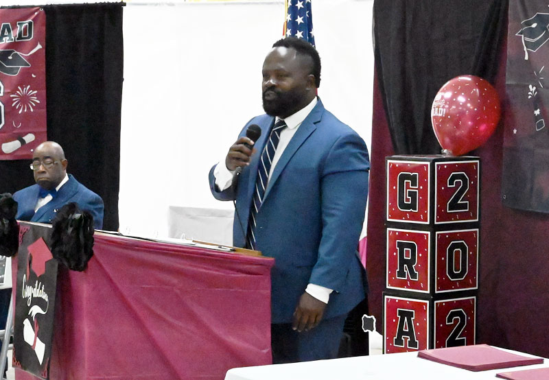 Michael McKenzie, Principal at Mart, speaks to the graduates.